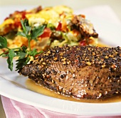 Ostrich steak with vegetable gratin