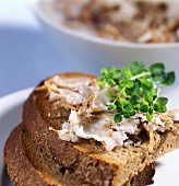 Goose rillettes with fresh thyme on farmhouse bread