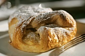 Cottage cheese pastry (Topfengolatsche) with icing sugar