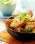Shellfish platter with strips of leek