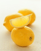 Lemons and wedge of lemon