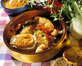 Bouillabaisse with slices of bread