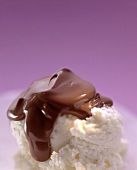 White chocolate ice cream with chocolate sauce