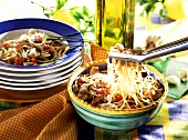 Spaghetti vongole with tomatoes and mushrooms