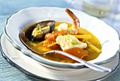 Fish soup with mussels, shrimps and tomatoes