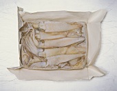 Frozen cuttlefish in opened packaging