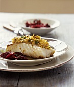 Fish fillet with potato and mustard crust and beetroot