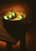Limes in wooden bowl