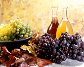 Autumn still life with grapes and grape must