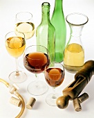 Various wine glasses and wine bottling equipment