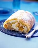 Sponge roll with fruit and cream