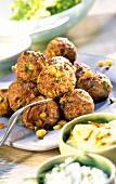 Small meat and vegetable rissoles with dips and salad