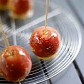Candied apples on cake rack