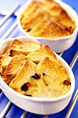 Bread pudding with raisins in baking dish