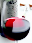 Claret in glass and bottle