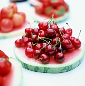 Cherries on slice of water melon