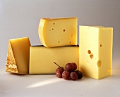 Various types of hard cheese from Vorarlberg; red grapes