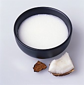 Coconut milk in black bowl
