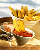 Chips with tomato dip and cocktail sauce