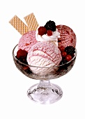 Berry ice cream with berry compote, cream and wafer