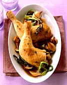 Chicken legs with mushrooms and shallots