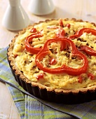 Sauerkraut and pepper quiche with caraway in baking dish