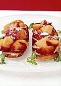 Bruschetta with fruit, icing sugar and mint