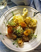 Pork fillet with apricots, ribbon pasta and cress