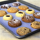 Assorted biscuits on baking tray