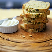 Slices of pistachio bread with butter