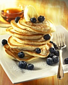 Pancakes with blueberries and maple syrup