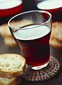 Glass of red wine and white bread