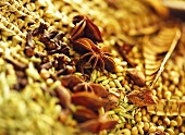 Assorted spices with star anise in basket