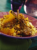 Lamb chops with couscous and oranges