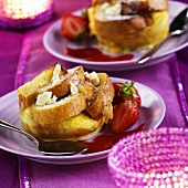 Bread pudding with strawberry sauce