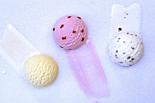 Three different scoops of ice cream