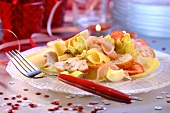Pasta salad with chicken, tomatoes and egg