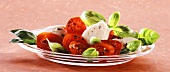 Tomatoes with mozzarella and basil