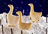 Goose biscuits in icing sugar snow
