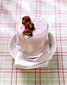 Strawberry shake with skewered fruit