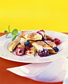 Berry pancakes (Schmarrn) with icing sugar