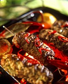 Kebabs with cevapcici and peppers on barbecue