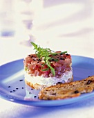 Tuna tartare with creamed cucumber & toasted olive bread