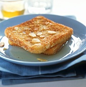 Toast with almonds and honey sauce