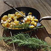 Fried potatoes with garlic and rosemary