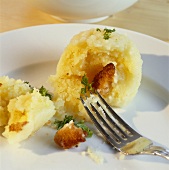 Potato dumpling with croutons
