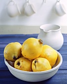 Quinces in white dish