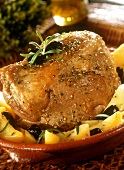 Roast lamb with potatoes and olives