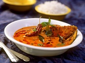 Sarson macchi (fish curry with rice, West Bengal, India)