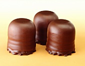 Three chocolate marshmallows